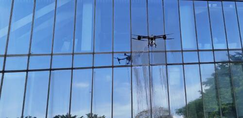 ข่าวล่าสุดเกี่ยวกับ MYUAV UAV การใช้งานจริง: การทําความสะอาดอย่างมีประสิทธิภาพของผนังม่านอาคารเชียงใหม่ฮานจิง